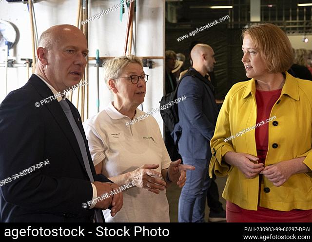 03 September 2023, Berlin: Chairwoman and founder of the Berliner Tafel Sabine Werth (center) speaks with Governing Mayor Kai Wegner (CDU) and Federal Minister...