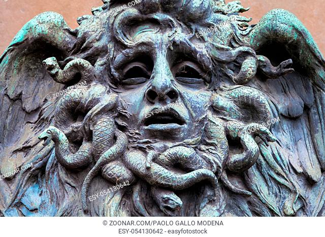 Italy, Turin. This city is famous to be a corner of two global magical triangles. This is a Medusa's head made of bronze close to the historical garden of...