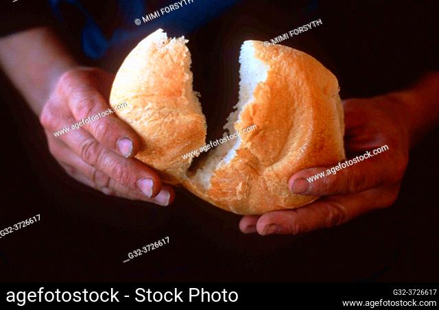 hands breaking bread, New Mexico