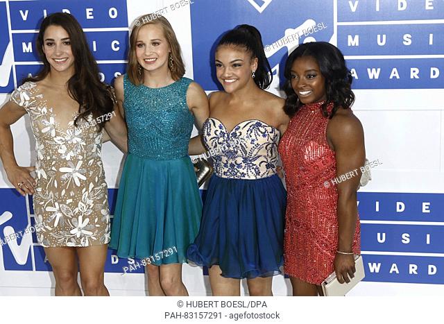 US gymnasts Aly Raisman (l-r), Madison Kocian, Laurie Hernandez and Simone Biles attend the MTV Video Music Awards, VMAs