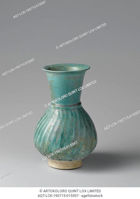 Fluted pear-shaped ewer with a turquoise glaze, Can of quartz fryer with a ribbed, pear-shaped body covered with a monochrome green-turquoise alkaline glaze