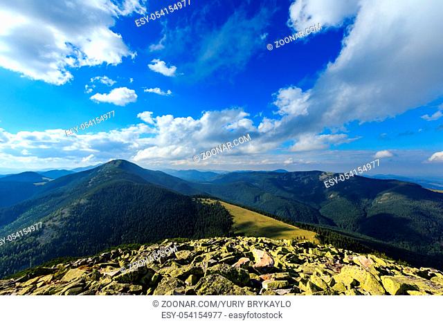 Summer Carpathian mountain top view from stony summit of Homiak Mount (Gorgany, Ukraine)