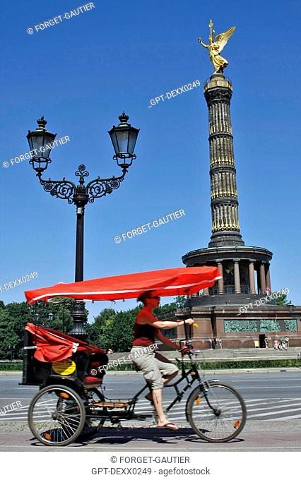 TAXIBIKE IN FRONT OF THE VICTORY COLUMN, SIEGESSAULE, A 67M HIGH COLUMN COMMEMORATING PRUSSIAN MILITARY VICTORIES, TOPPED BY THE 'GOLDELSE', BERLIN, GERMANY