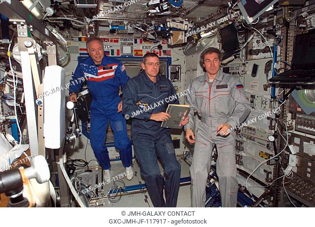 Russian Federal Space Agency cosmonaut Sergei K. Krikalev (right), Expedition 11 commander; astronaut William S. McArthur Jr