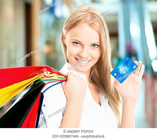 Woman With Bags And Credit Card