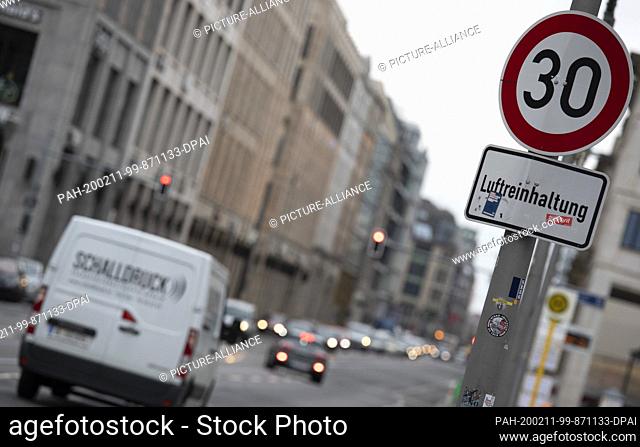 11 February 2020, Berlin: Vehicles are on the road on Leipziger Straße. Here, a speed limit of 30 km/h applies for air pollution control