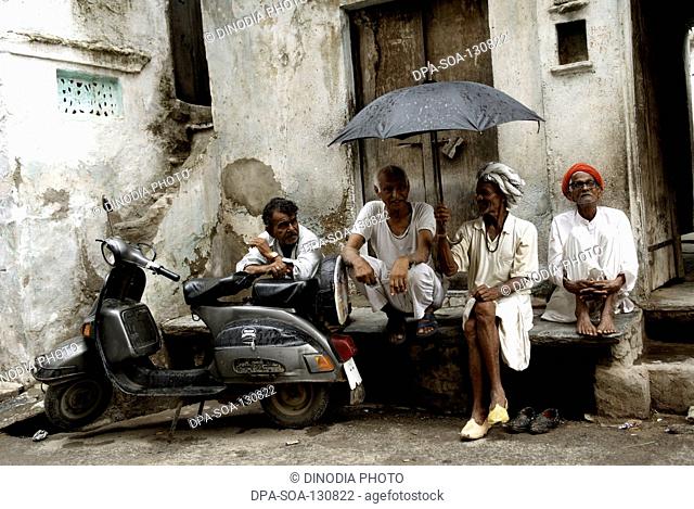 Men seating in front of their house ; Dilwara ; Rajasthan ; India