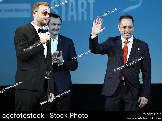 RUSSIA, MOSCOW - APRIL 12, 2023: Russian film director Klim Shipenko (L) and Russian cosmonaut Anton Shkaplerov attend an event at the State Kremlin Palace on...