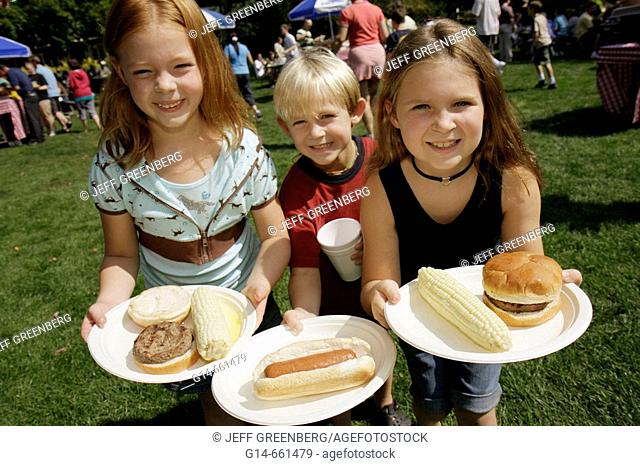 Pennsylvania, Pocono Mountains, Hawley, Woodloch Resort, picnic, girls, boy, paper plate, hot dog, hamburger, corn on cob
