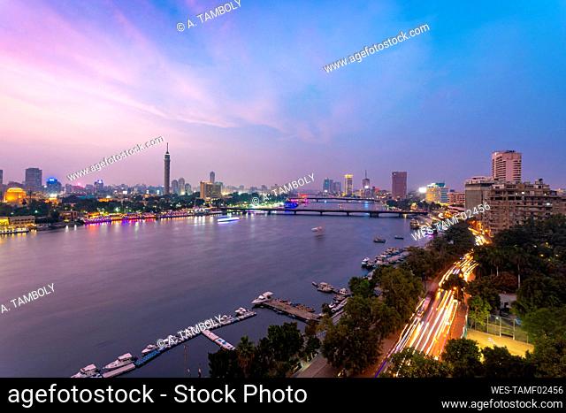 Egypt, Cairo, Nile with Cairo Tower on Gezira Island at dusk