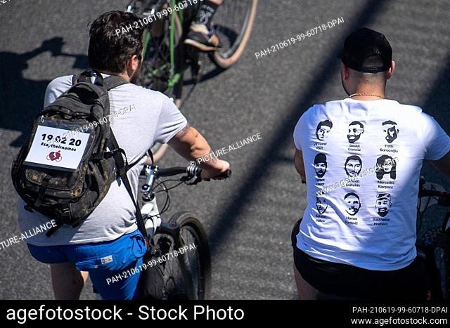 19 June 2021, Hessen, Frankfurt/Main: Cyclists ride in the direction of Hanau during the ""Star for Hanau"" bicycle rally in memory of the right-wing terrorist...
