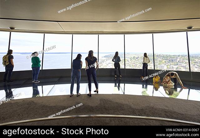 Indoors viewing platform with glass panorama wall and glass floor. Space Needle, Seattle, United States. Architect: Olson Kundig, 2020
