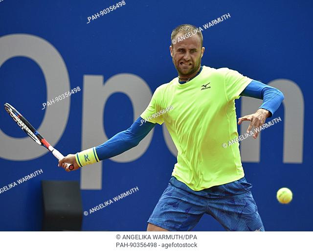 Marius Copil of Romania in action against Roberto Bautista Agut (not pictured) of Spain during their 2nd round single men's match at the ATP tennis tournament...