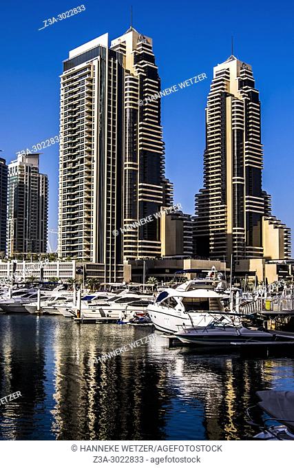 Supertall skyscrapers and a lot of boats at Dubai Marina, Dubai, UAE
