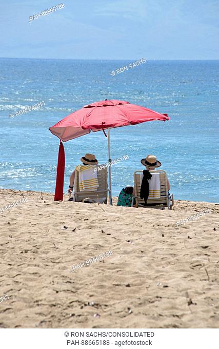 Beach umbrellas along Kaanapali Beach in Lahaina, Maui, Hawaii on Thursday, March 2, 2017. Kaanapali Beach is the home of several hotels and time shares along...