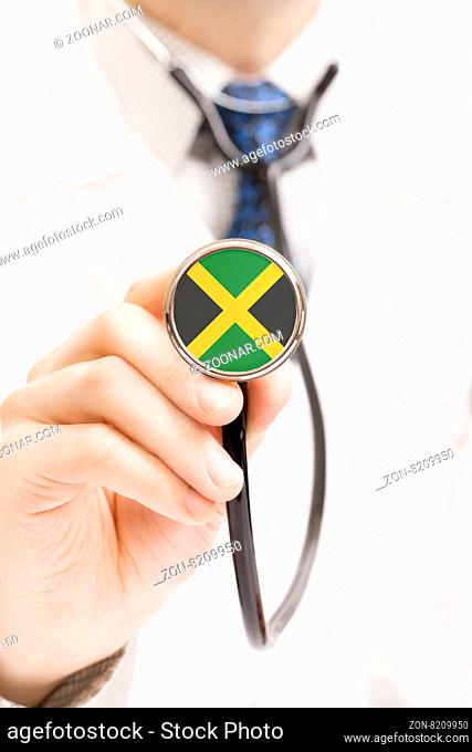 Medical doctor with stethoscope in his hand