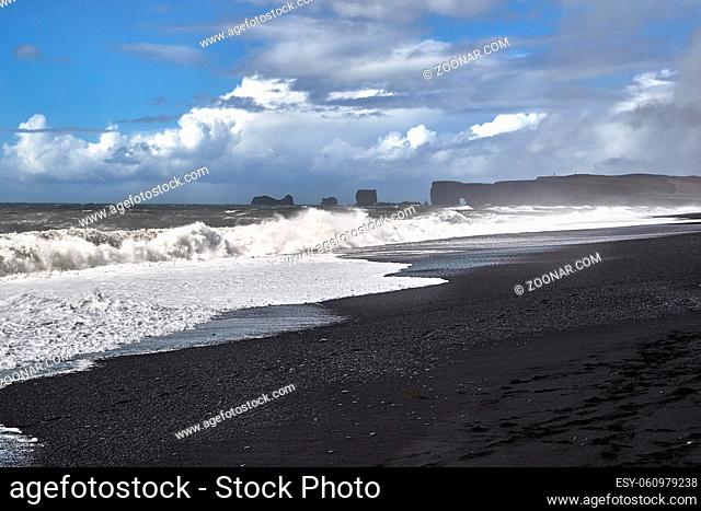 Waves at Rejnisfjara black sand beach, slow motion form 120 fps
