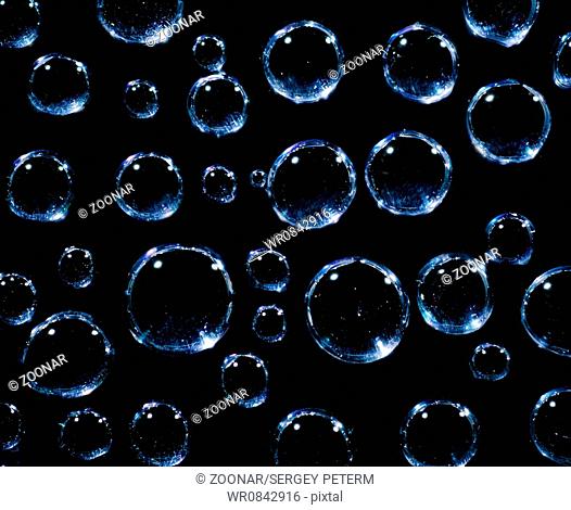 Water droplets on a black background
