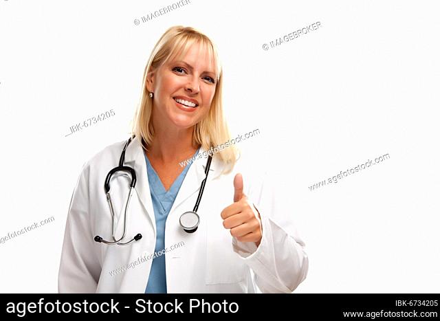 Friendly female blonde doctor or nurse with thumbs up isolated on a white background