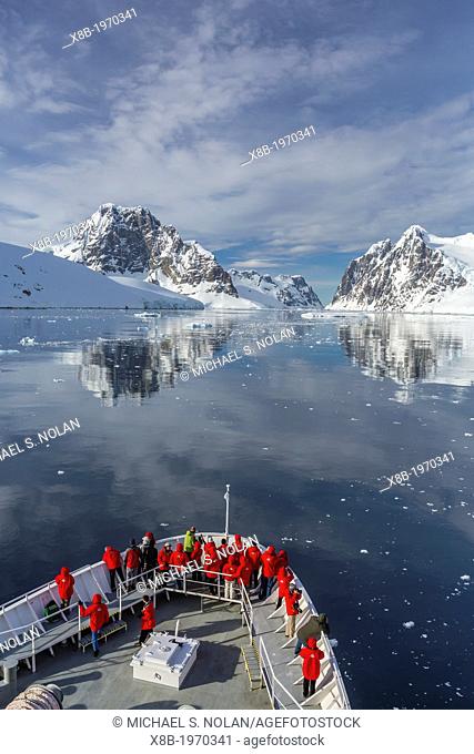 The Lindblad Expedition ship National Geographic Explorer on expedition in the Lemaire Channel in Antarctica, Southern Ocean