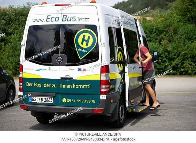 29 July 2018, Germany, Bad Gandersheim: A passenger boarding the Ecobus. The Max Planck Institute for Dynamics and Self-Organization is testing the so-called...