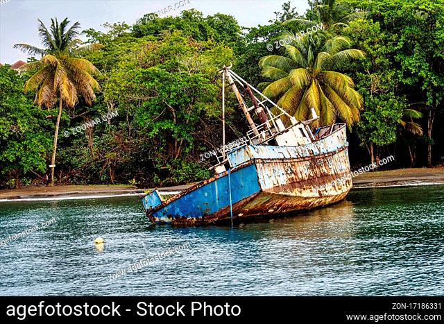 wreck in the Blue Lagoon at St. Vincent and the Grenadines in the Caribbean Sea, Lesser Antilles, West Indies