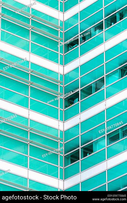 Green and white modern office building detail