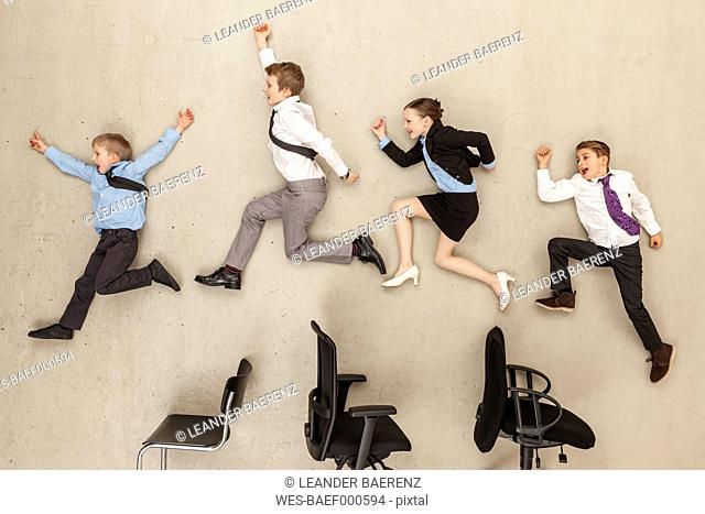 Business kids running in office