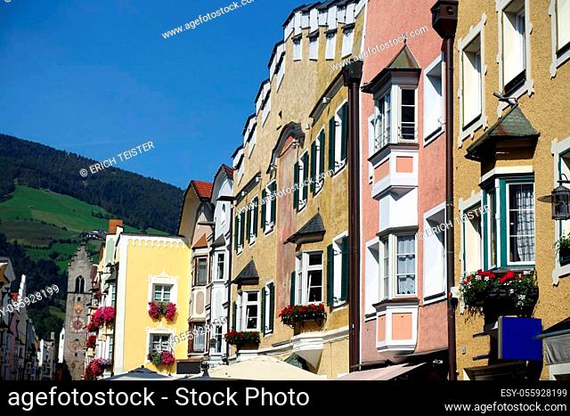 Town houses in the historical new town of Sterzing, in the background the Zwölferturm, South Tyrol, Italy