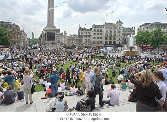 2, 000 square metres of turf, laid as part of Visit London's campaign, to promote green spaces in city, Trafalgar Square, London, England