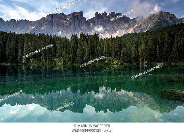 Italy, South Tyrol, Lake Karersee and Latemar group