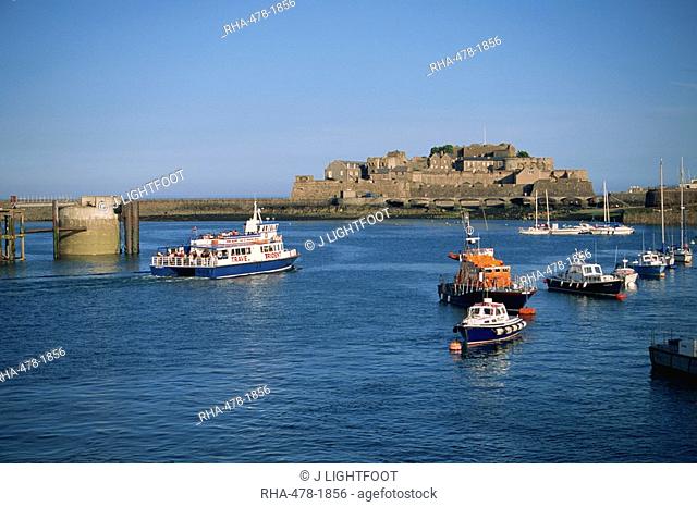 Ferry passing Castle Cornet, St. Peter Port, Guernsey, Channel Islands, United Kingdom, Europe
