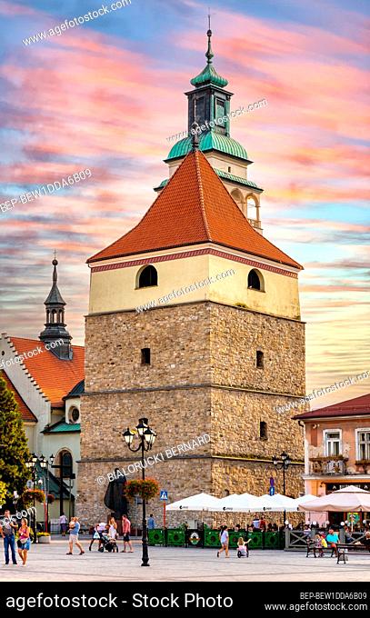 Zywiec, Poland - August 30, 2020: Panoramic view of market square with historic stone bell tower and Cathedral of Nativity of Blessed Virgin Mary in Silesia...