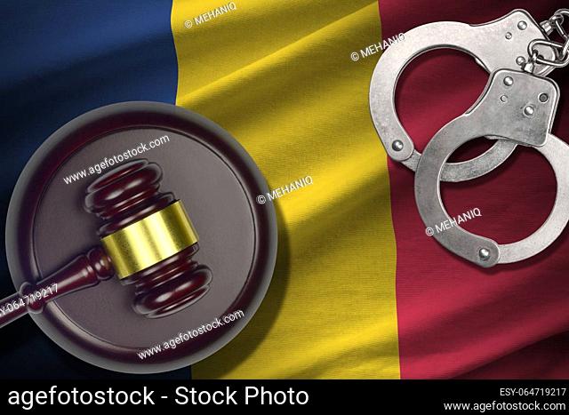 Chad flag with judge mallet and handcuffs in dark room. Concept of criminal and punishment, background for guilty topics