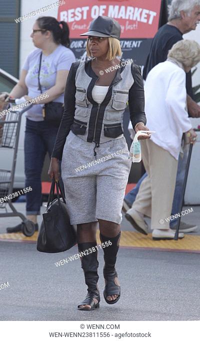 Mary J. Blige wearing knee high gladiator sandals while shopping at Bristol Farms with a friend Featuring: Mary J. Blige Where: Beverly Hills, California