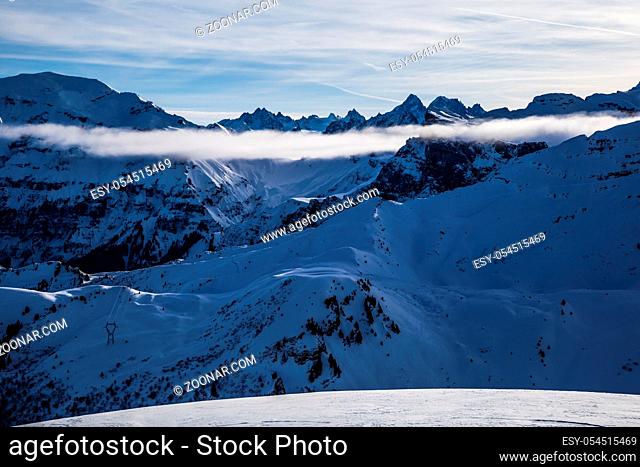 Snowy winter French Alps, ski resort Flaine, Grand Massif area within sight of Mont Blanc, Haute Savoie, France