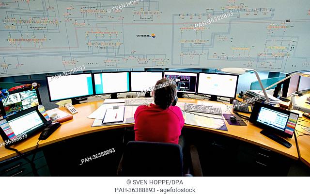 An employee of Vattenfall Europe Distribution Berlin GmbH sits in Vattenfall's central network control room in Berlin,  Germany, 23 January 2013