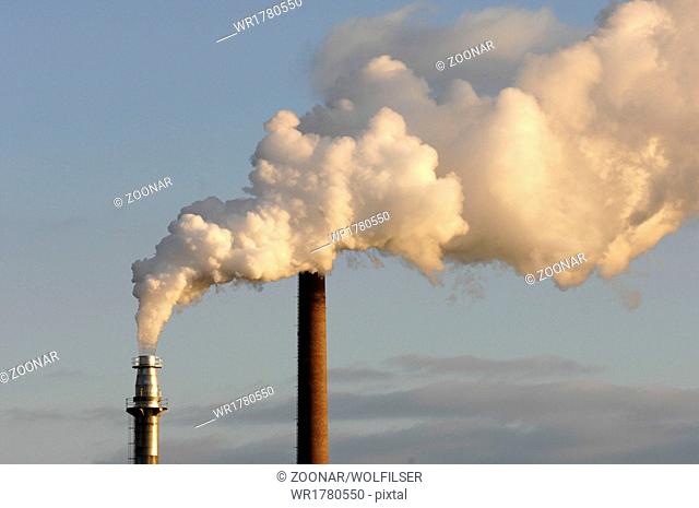 industry chimneys produce steam at air