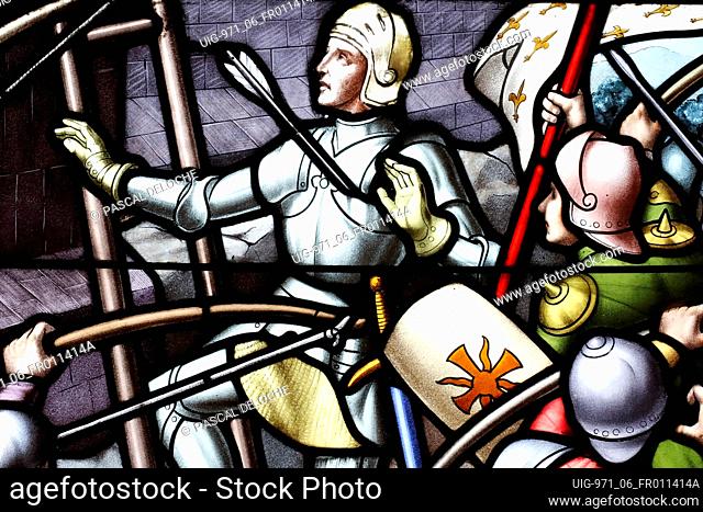 Saint Thomas of Cantorbery church. Stained glass window. Joan of Arc. Militatry campaigns. Cuiseaux. France