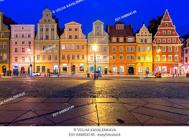 Colorful tenements on Market Square during morning blue hour in the Old Town of Wroclaw, Poland