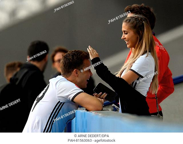 Germany's Mario Goetze smiles to his girlfriend Ann-Kathrin Broemmel after the UEFA EURO 2016 Round of 16 soccer match between Germany and Slovakia at the...