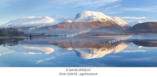 Snow capped Ben Nevis reflecting on the calm surface of Loch Linnhe at Corpach near Fort William, Highlands, Scotland, United Kingdom, Europe