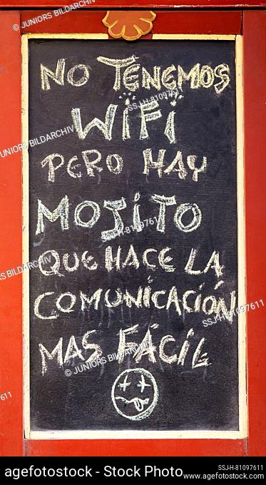 Signboard at a bar in Havana Vieja, Havana, Cuba (We don't have wifi but there is mojito to make communication easier)
