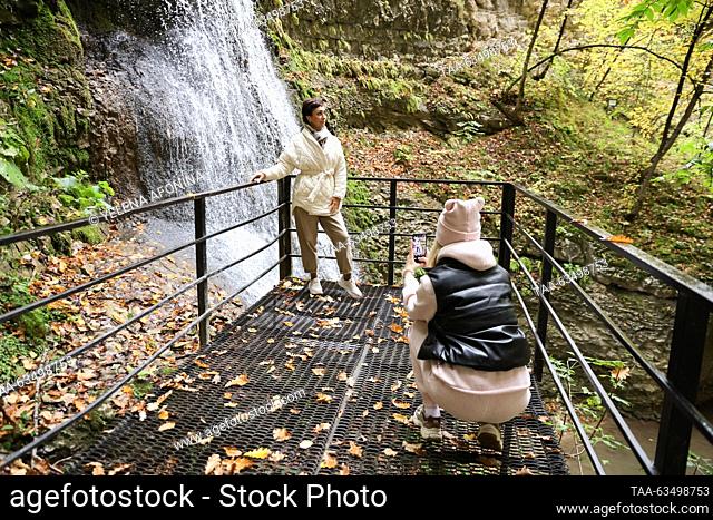 RUSSIA, CHECHEN REPUBLIC - OCTOBER 17, 2023: Tourists visit Nikhaloy Waterfalls in the Shatoy District. Yelena Afonina/TASS