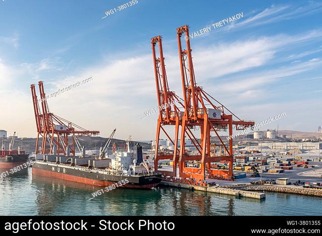 Salalah, Oman - November 19, 2019: Bulk Carrier African Spoonbill moored in Port of Salalah in Oman, Arabian Sea. Loading and unloading, export-import