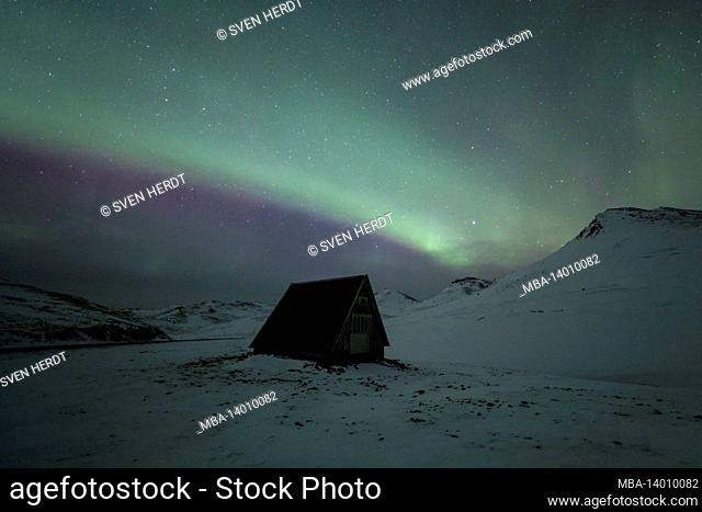 northern lights over a refuge on the snaefellsnes peninsula