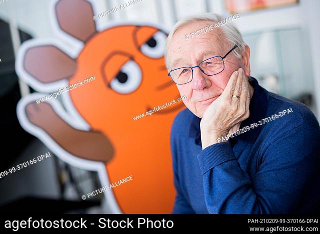 09 February 2021, North Rhine-Westphalia, Cologne: Armin Maiwald, filmmaker, author and co-inventor of the ""Sendung mit der Maus"" is sitting in the foyer of...