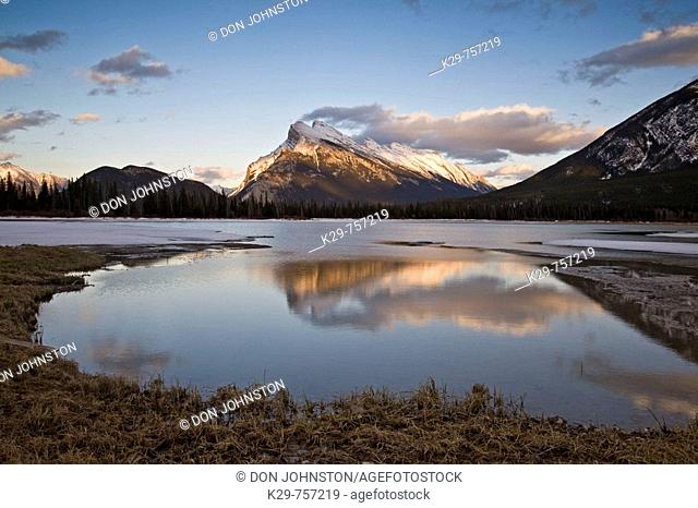 Mt Rundle reflected in Vermilion Lake in early spring/late winter. Banff National Park, Alberta