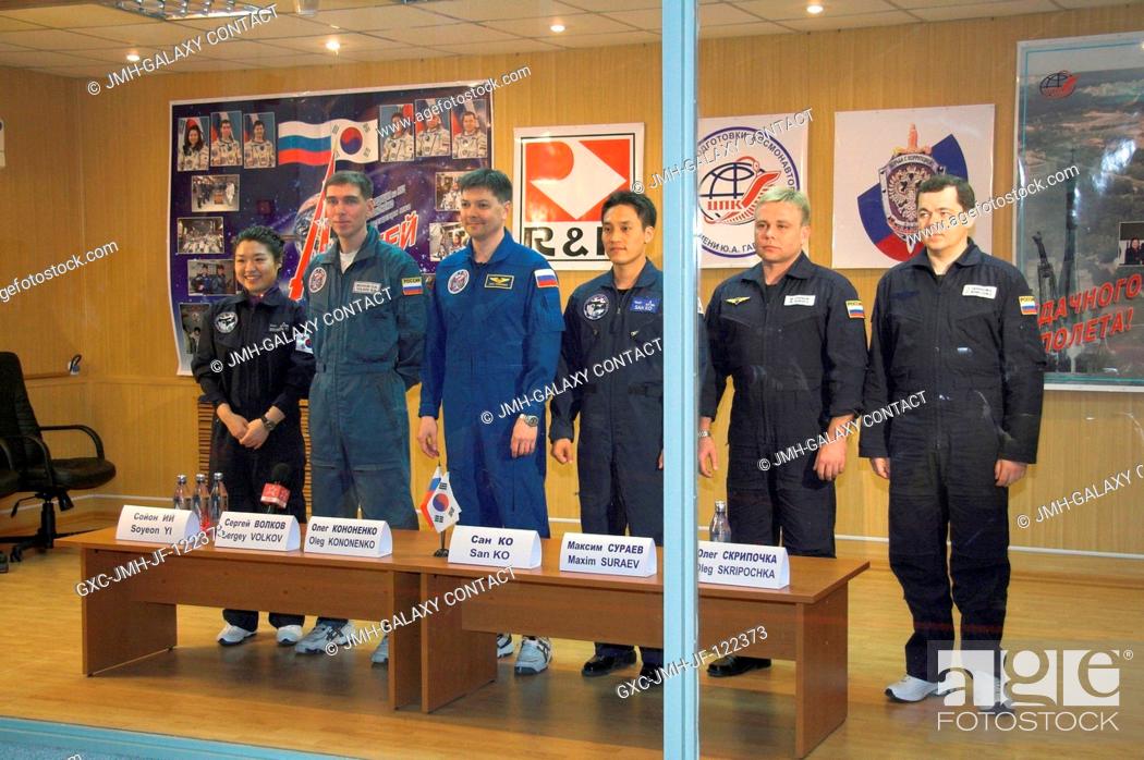Stock Photo: At their crew quarters in Baikonur, Kazakhstan, the prime and backup crewmembers for the next flight to the International Space Station pose for pictures on.