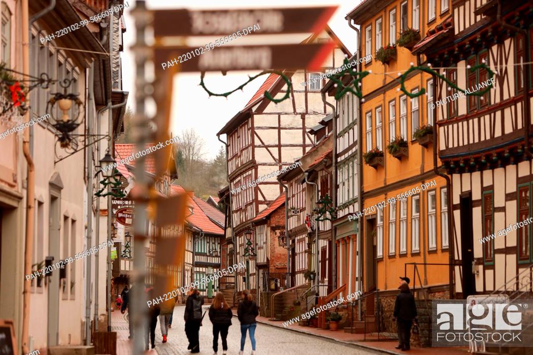 Stock Photo: PRODUCTION - 02 January 2022, Saxony-Anhalt, Stolberg: Old half-timbered houses in the Harz village of Stolberg. In 2019.